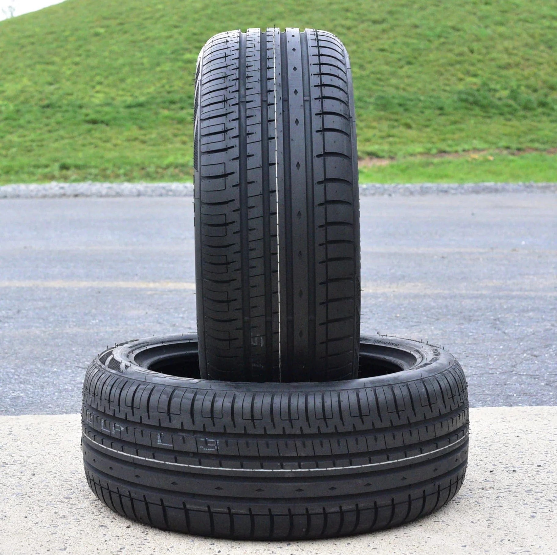 A pair of 2(2) 225/40R20 101W XL AS A/S performance tires